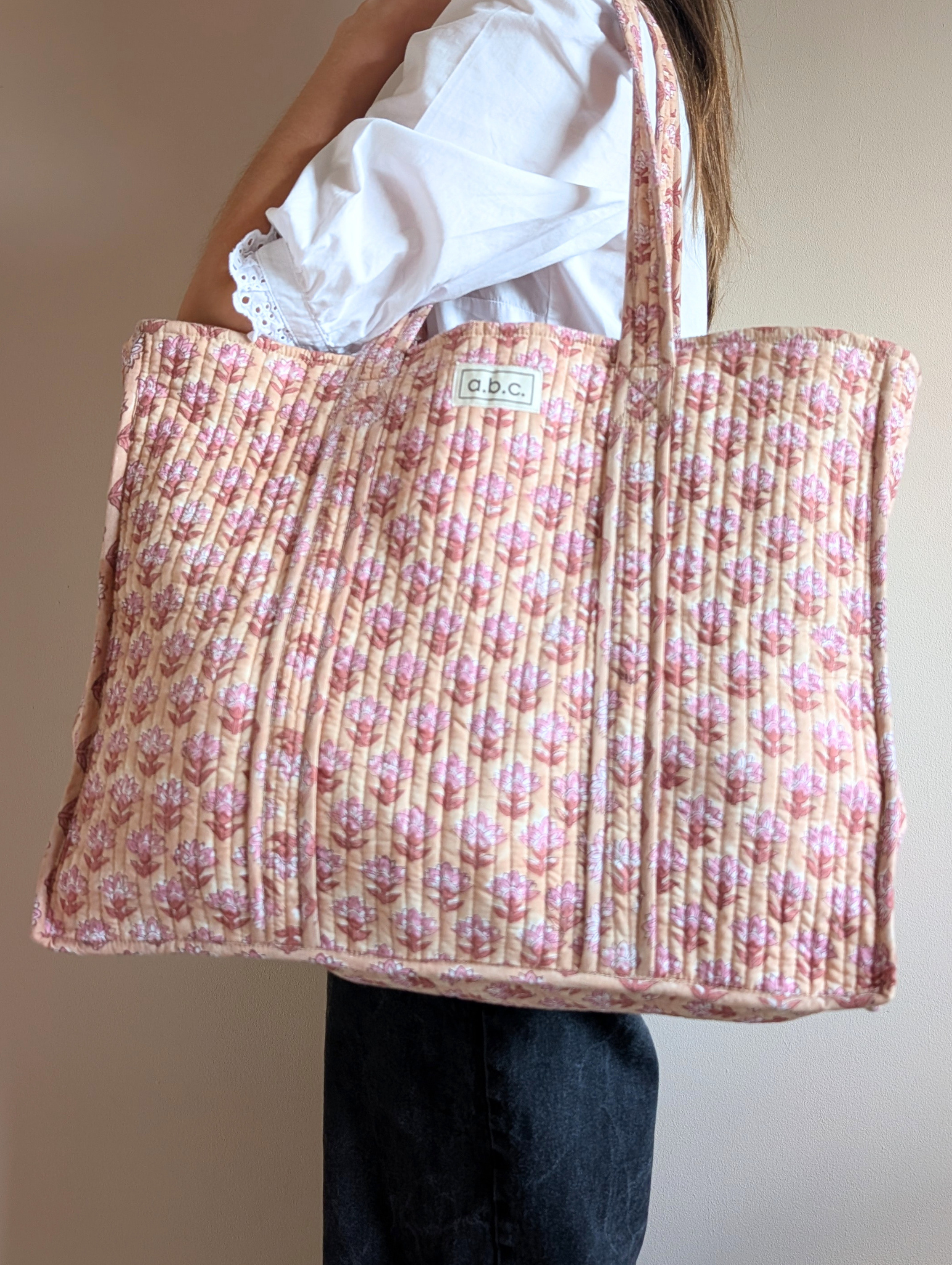 beige and pink floral tote bag