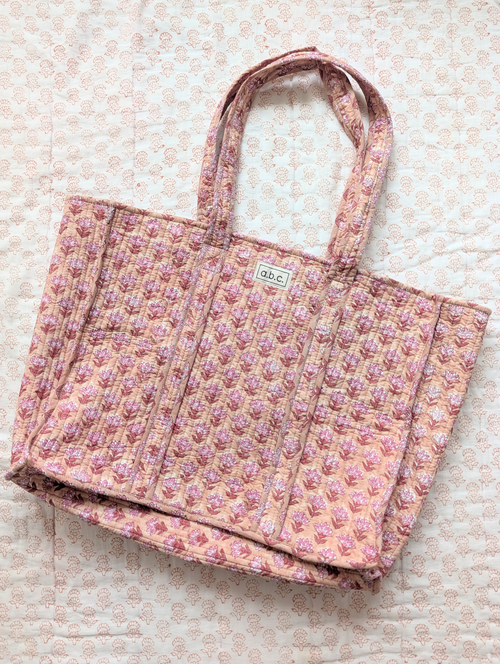 beige and pink floral tote bag